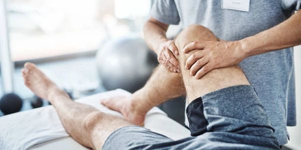 registered physiotherapist performing rehab assessment 