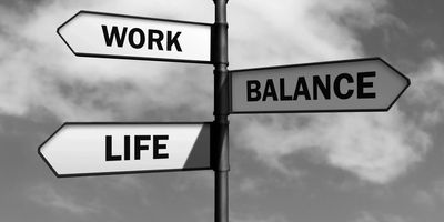 road sign with Work, Life, and Balance, as directions