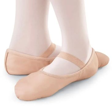 Soft pink ballet slippers worn with white tights.