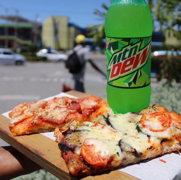 pizza slices and a mountain dew