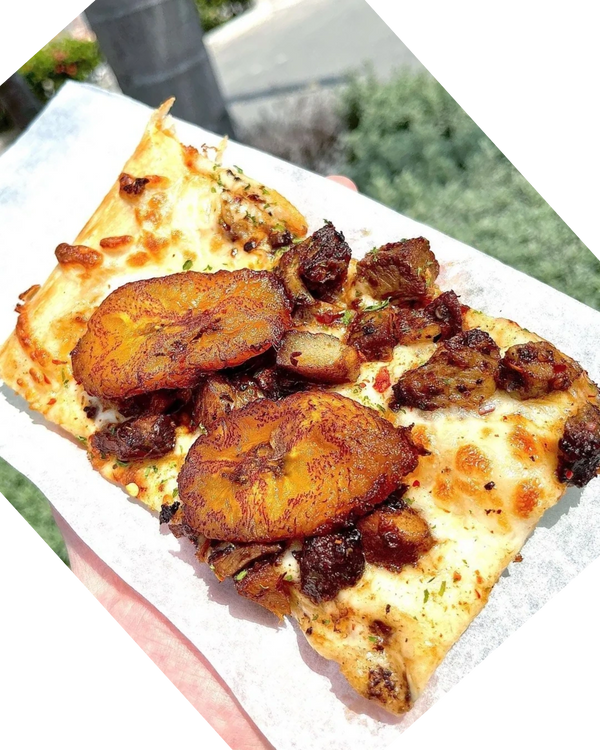 A slice of jerk pork and friend ripe plantain pizza from Pizza Please, Italian Jamaican restaurant i