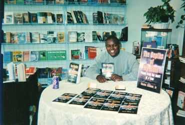 First book signing at Willmax Bookstore, 2002.