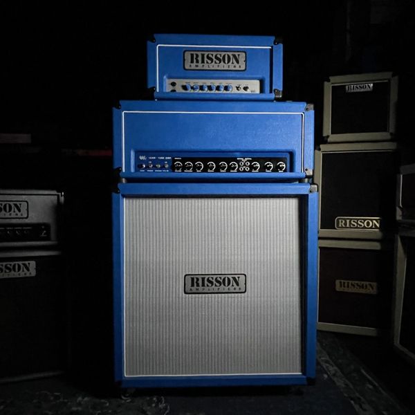 Blue Risson guitar amplifier stack with head and speaker cabinet.