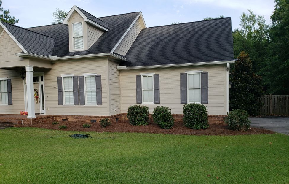 Pinestraw laid and bushes cut back North Augusta 8/18