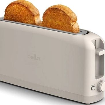 Beige toaster with two toasted bread slices.