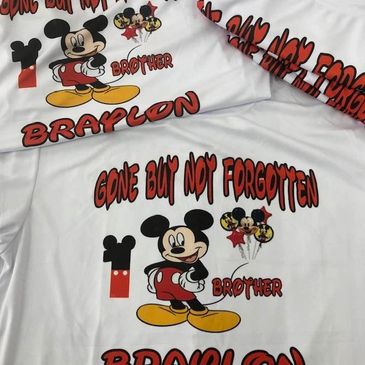 White T-shirt which has an image of Mickey Mouse character and words on a t-shirt that says Gone but