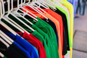 A picture of different colors of t shirts 