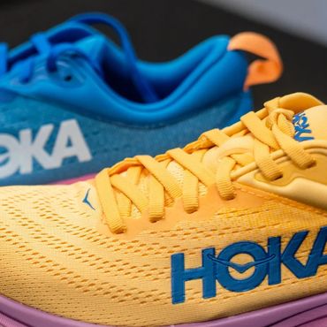 A picture of Hoka brand shoes in different colors