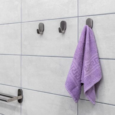 towel rack and wall-mounted hooks