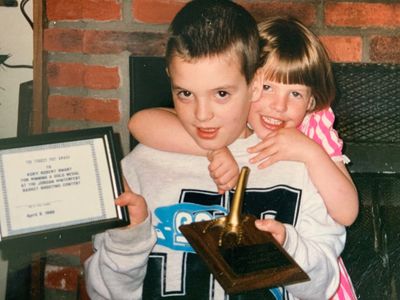 picture of boy receiving turkey foot award benedict family camillus ny