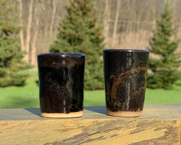 photo of starry night glaze on two different clay types with white dip