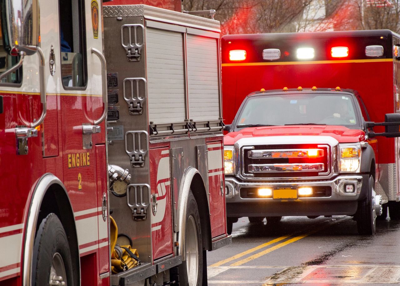 Firetruck and ambulance entering intersection. 