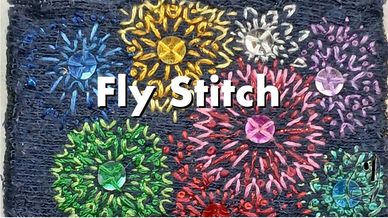 Fly stitch embroidered fireworks in a rainbow of colours