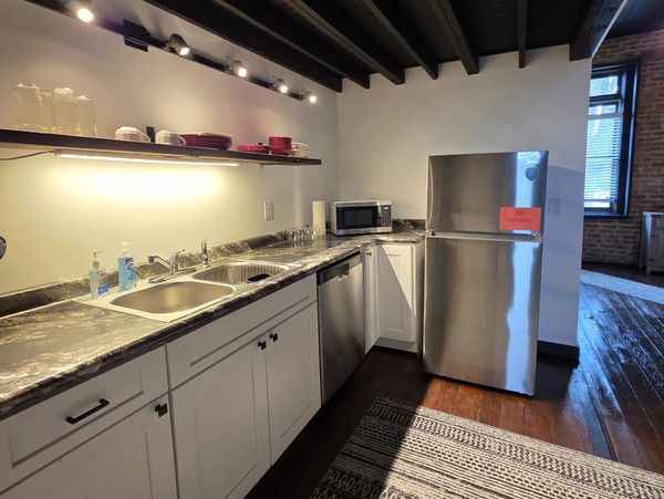 Renovated kitchen with white cabinets
