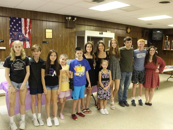 A group of people posing for a picture.