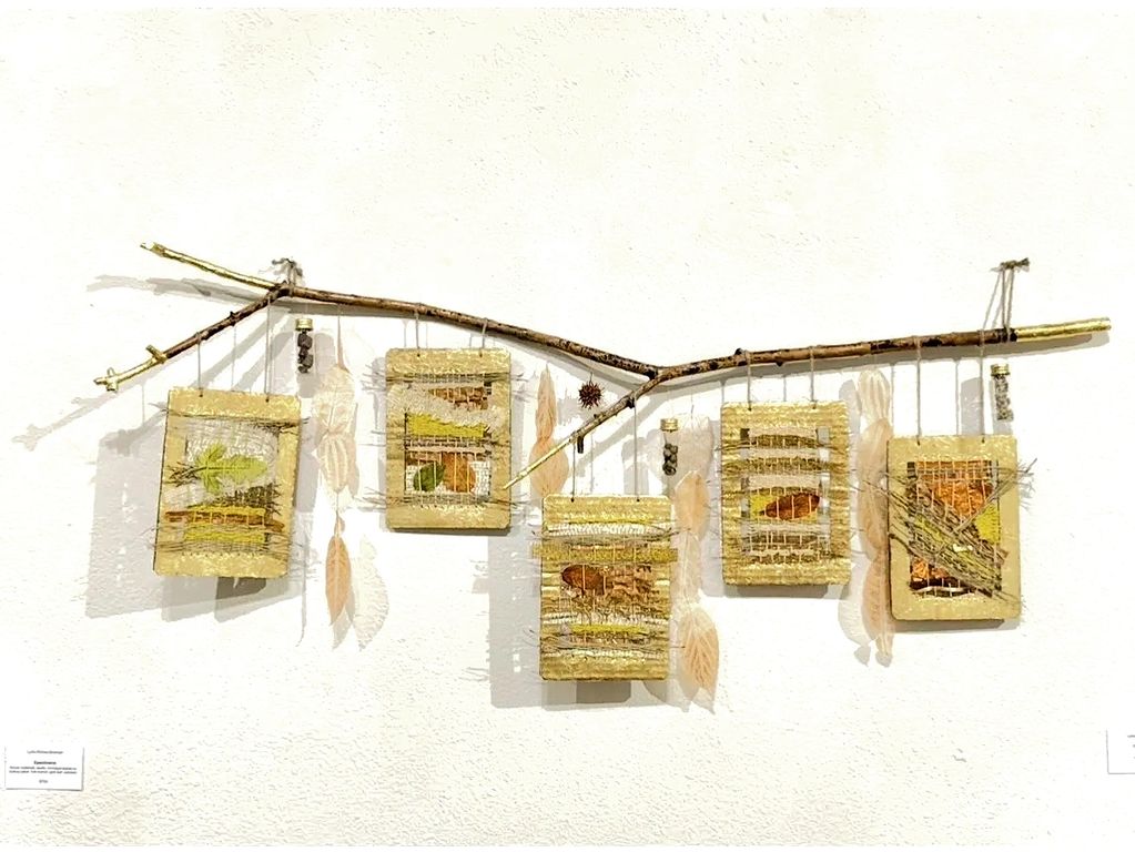 tree branch with weavings and monotype leaves