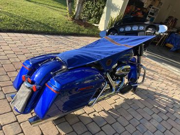 Chrome & cobalt duel the scorching sun. Custom Cruiser Canopy: Victory won.