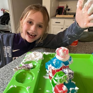 Preschool STEM Activity building with cubes and shaving cream, preschool winter stem activities 