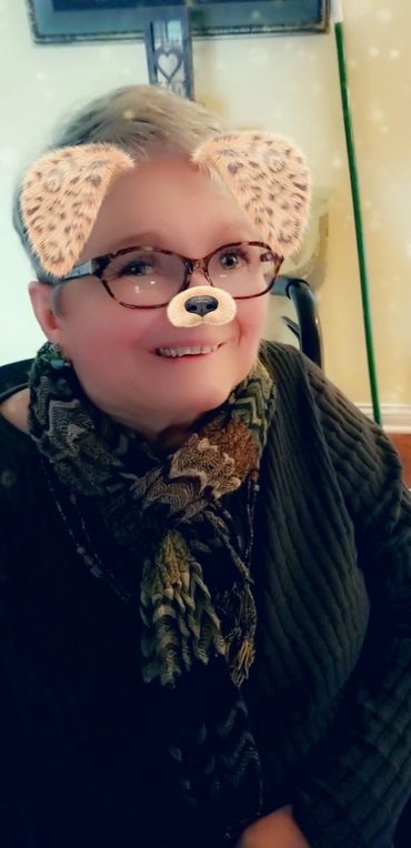 A woman using the dog camera filter