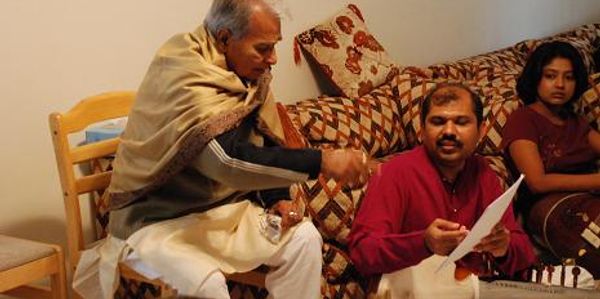 Gaurang & Dr. Doshi in conversation during orchestra preparations