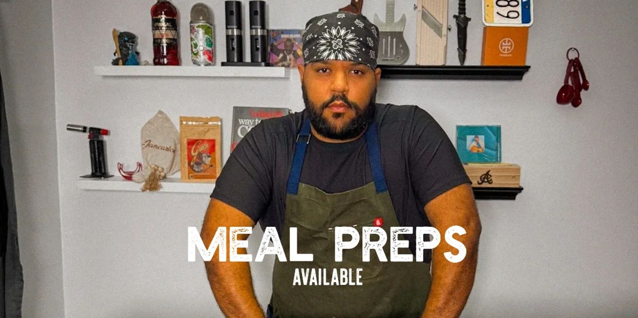 Chef advertising meal preps with a serious expression.