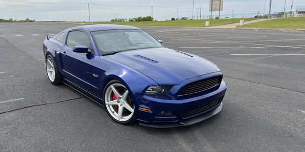 This 2013 Mustang GT has gone through the works.  A 3 years ceramic coating was applied