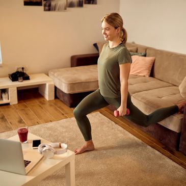 Woman following an online workout