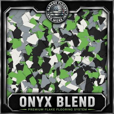 Green, black, gray, and white flake flooring sample.