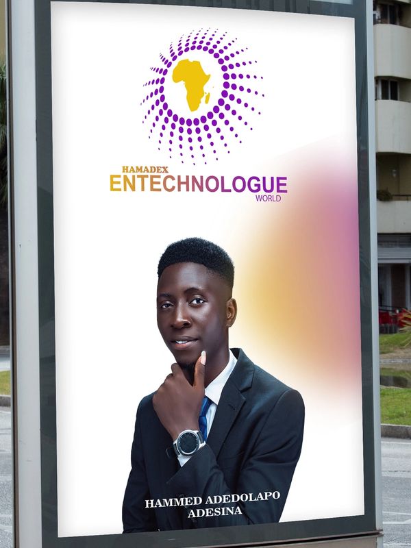 Young man in suit promoting HAMADex Entechnologue World.