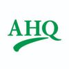 Green AHQ logo with a swoosh.