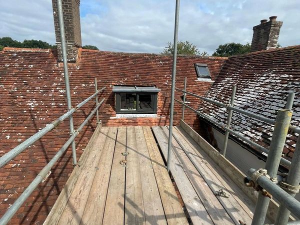 Scaffolding installed to access leaking roof & dormer window at a home in Lewes, East Sussex