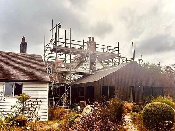 Scaffold built for roofing and chimney repairs in battle , East Sussex.