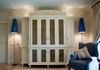 a bespoke armoire in a Mallorca apartment, designed to house the television and entertainment systems