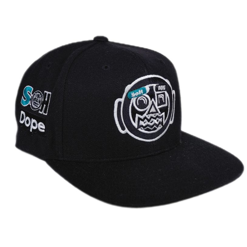 Black cap with a stylized face and text designs.
