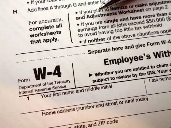 Close-up of a W-4 tax form from the IRS.