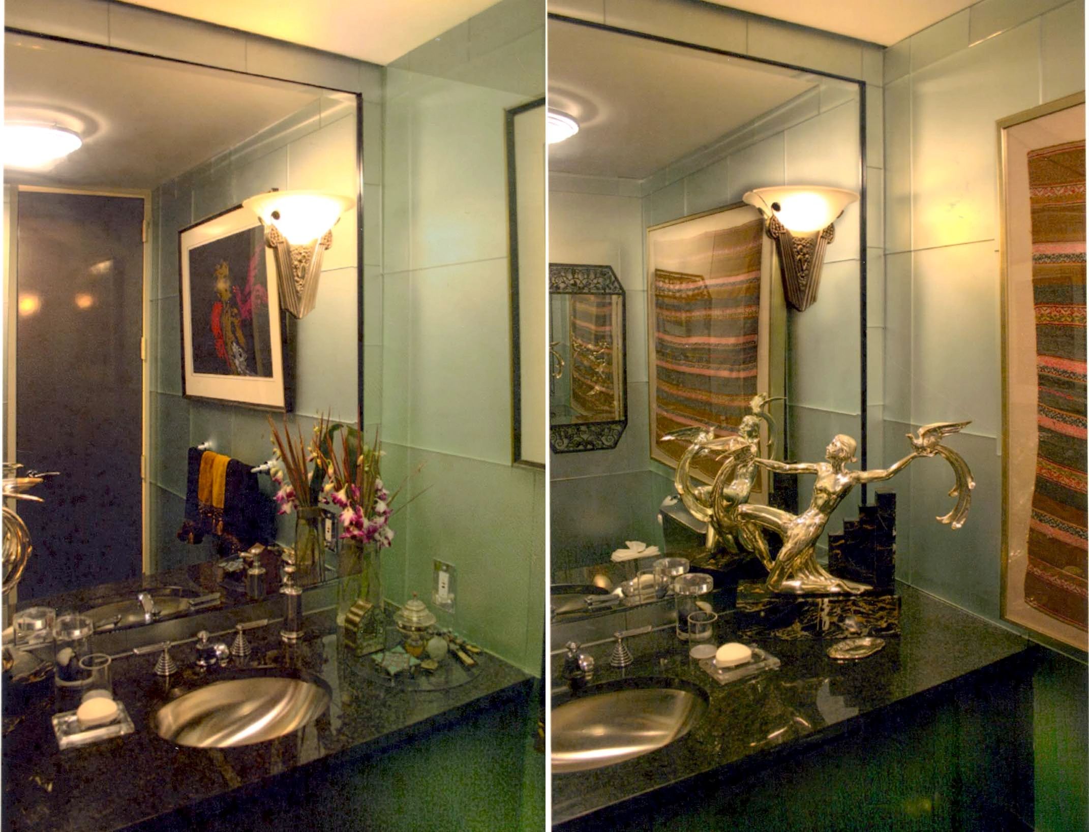 Elegant bathroom decor with sculptures and flowers.