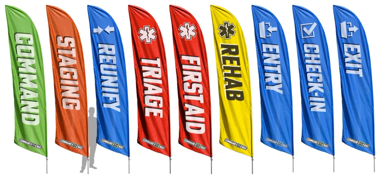 Colorful emergency and event command flags with various labels.