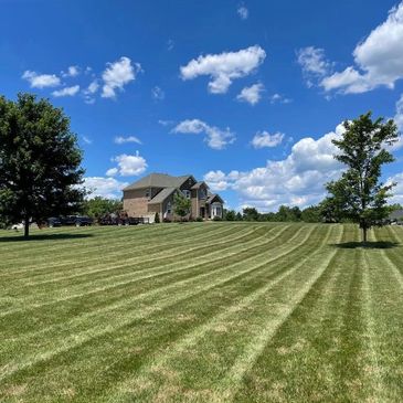 Image showing a completed property mowed by Yard Care Help LLC staff in 2022.