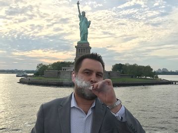 Jason Beck smokes a joint in front of the Statue Of Liberty.

www.highestrepublican.com