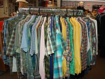 Racks of colorful western shirts.