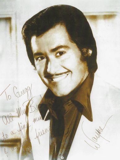 A portrait of Wayne Newton signed to Greg Koss. "All my best to a fine musician and a good friend."