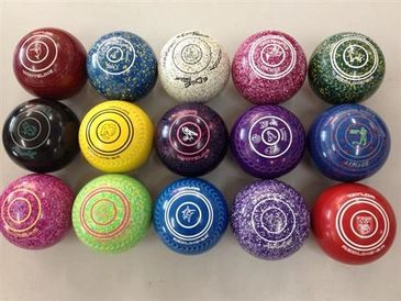 3 rows of colorful bowls. 