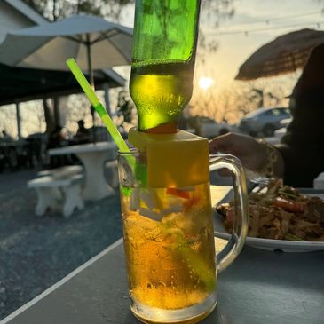 Cool drink in the sunset at Cik Eira Seafood