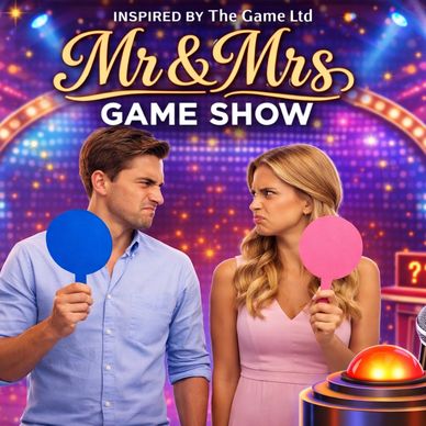 Couple competes with paddles on Mr &amp; Mrs game show stage.