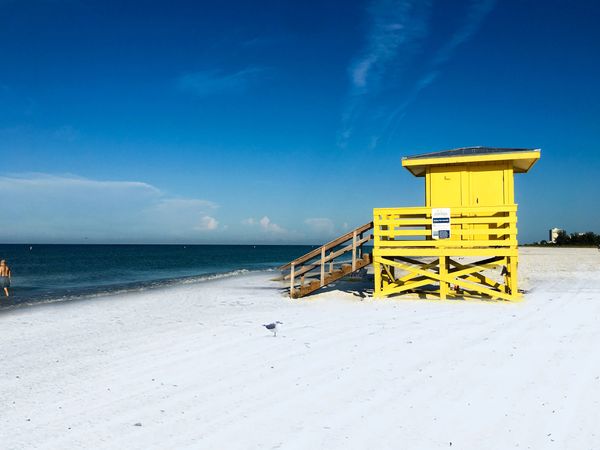 Yellow lifeguard stand on Siesta Beach