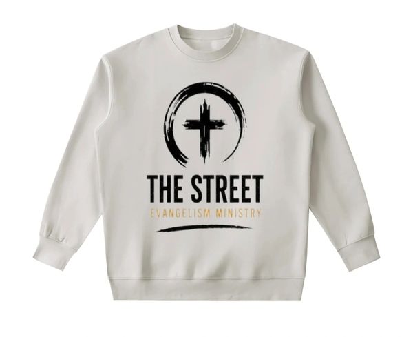 White sweatshirt with a black cross and text design.