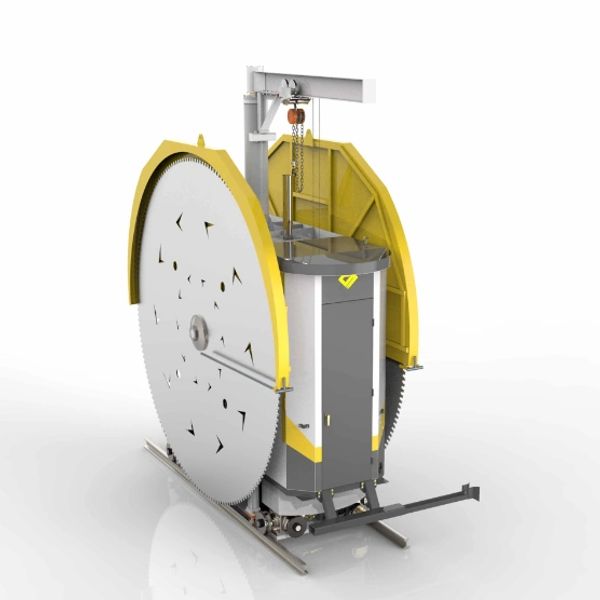 Large circular industrial saw with yellow protective covers and a central control unit.