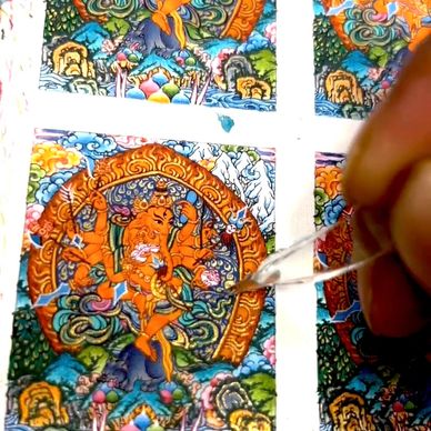 Polishing Gold on mini Ganesha Thangka.
