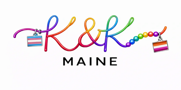 Colorful rainbow script with trans and lesbian pride charms and the word MAINE.