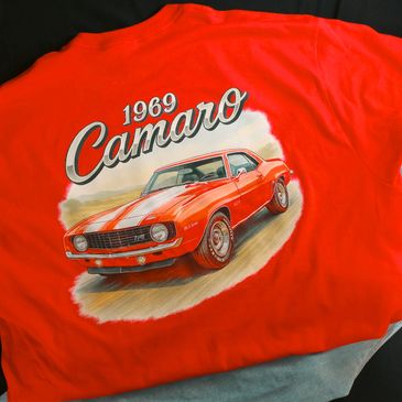 Red T-shirt featuring a 1969 Camaro car illustration.